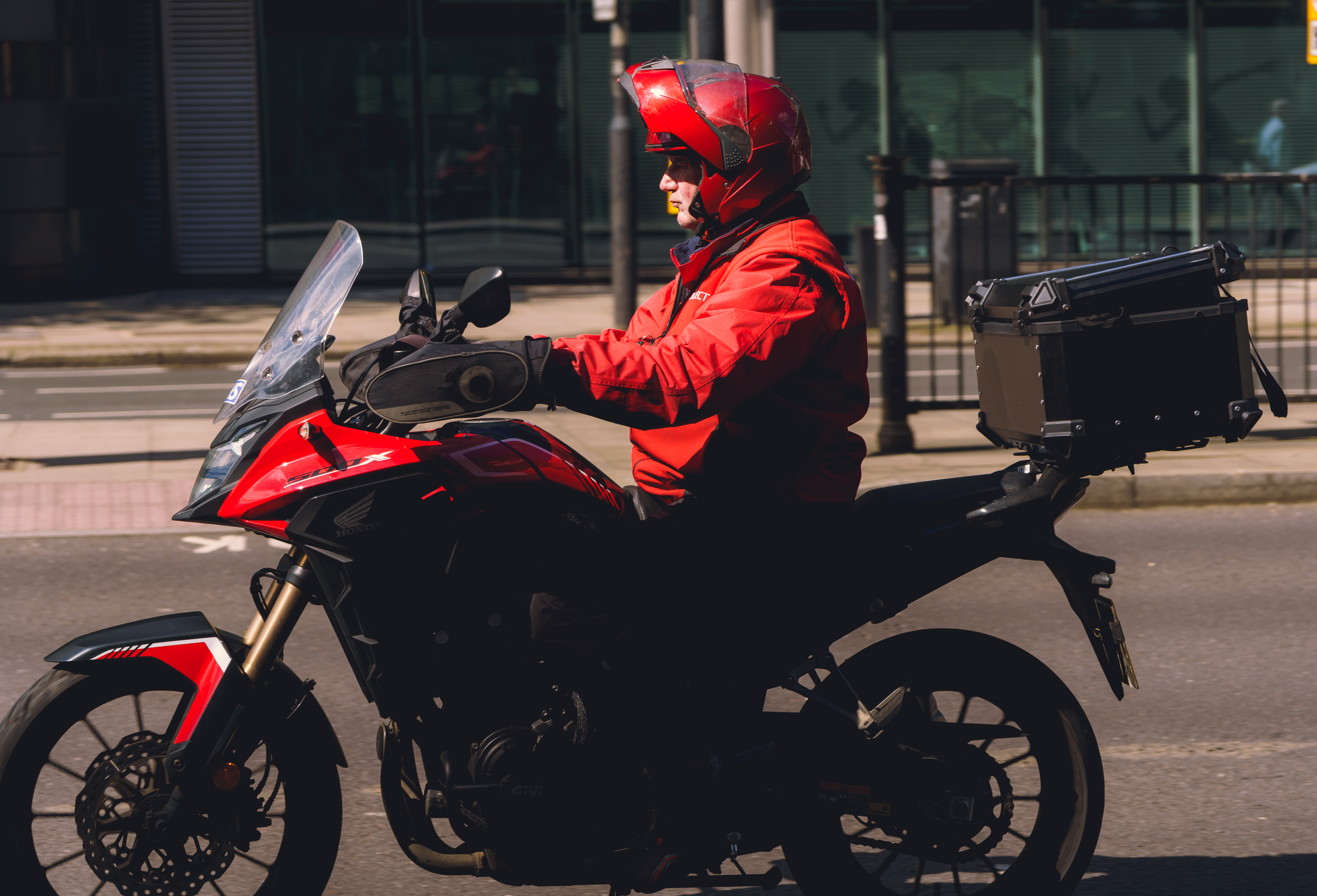 Man In Red On Motorcycle